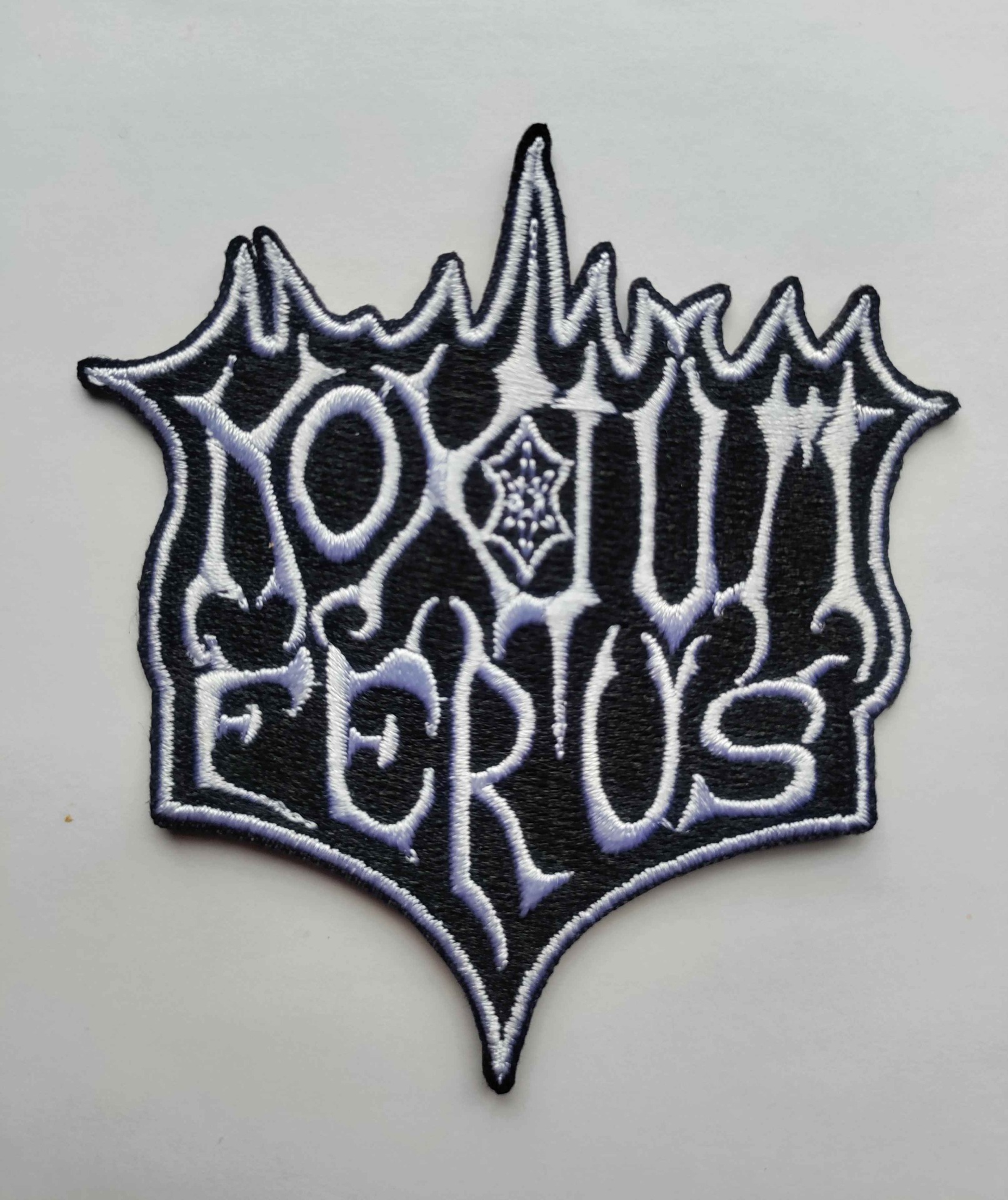 # 25- NF patch, white logo