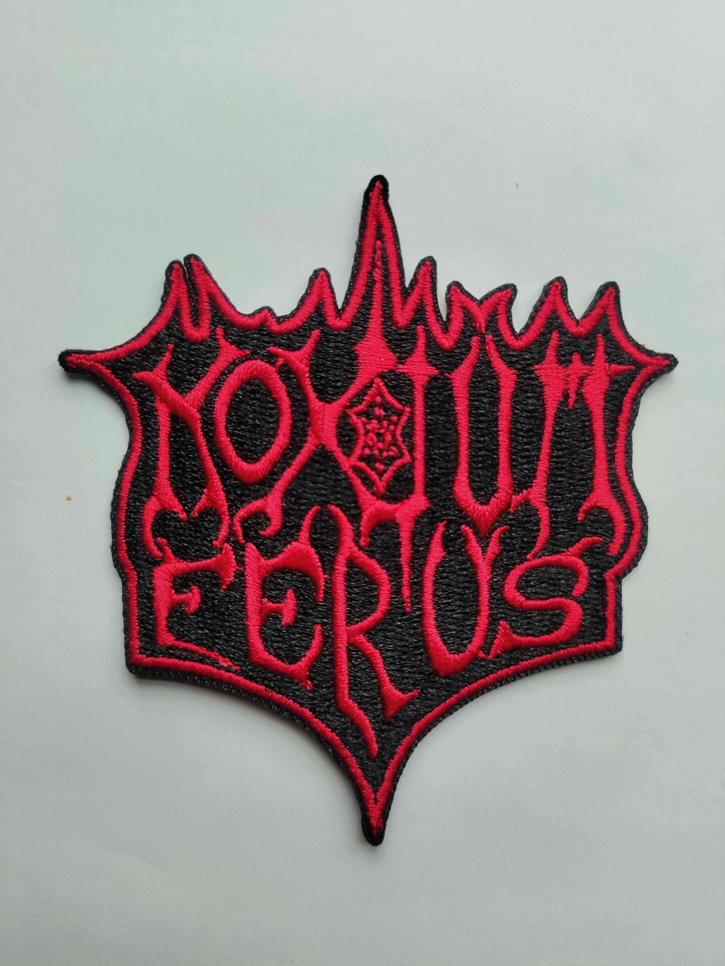 # 26 - NF patch, red logo